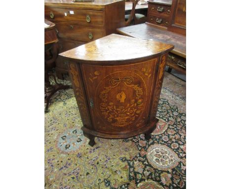 Small late 18th / early 19th Century Dutch marquetry bow fronted standing corner cabinet, the single door inlaid with floral 