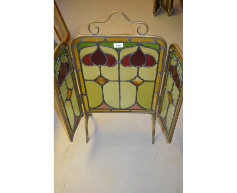 Late Victorian brass and leaded glass firescreen of Art Nouveau design