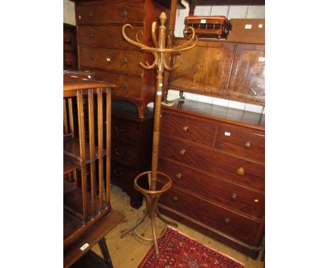 Reproduction beechwood hat and stick stand in Victorian style together with a modern rectangular bevelled edge wall mirror an