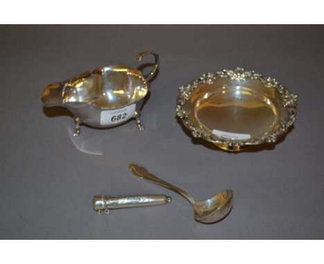 London silver trinket dish, silver sauce boat, small silver ladle and a silver mounted cheroot holder in a silver case