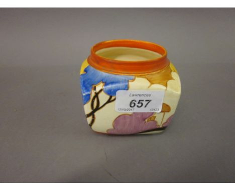 Clarice Cliff Bizarre squat irregular cube form vase decorated with polychrome trees in a landscape and cottage, approximatel