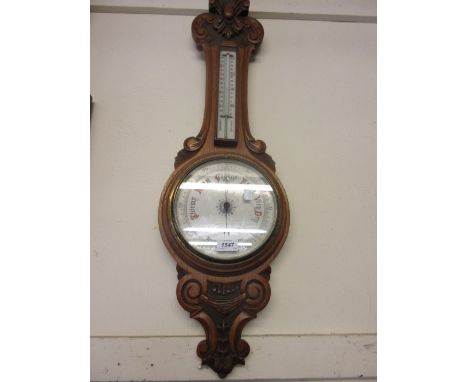 Carved oak aneroid barometer / thermometer
