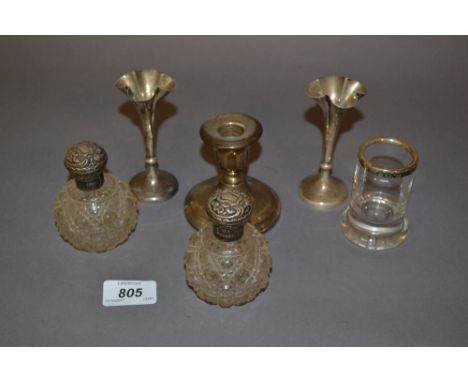 Pair of silver mounted cut glass perfume bottles, pair of small silver flared rim vases, silver dwarf candlestick (a/f) and a