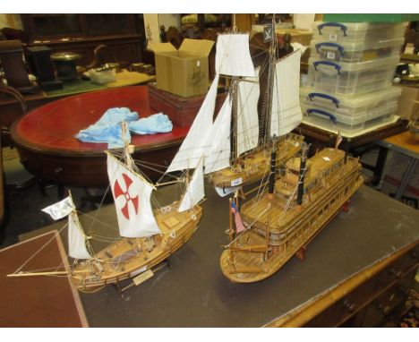 Group of three wooden scale models, two galleons and a paddle steamer