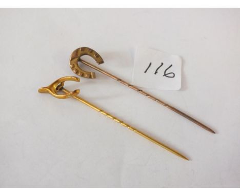 Gold wishbone stick pin and another     