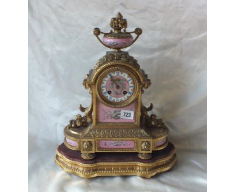 19thC French Ormolu mantle clock, panels painted with birds,  plants etc. the movement is striking upon bell, 13” high   