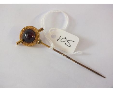 Gold mounted garnet and coral stick pin     