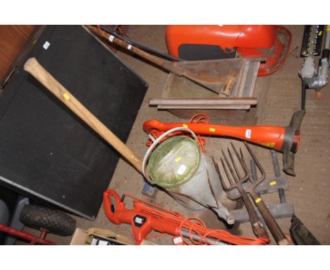 A galvanized watering can; together with a sledge hammer; fork heads and a wooden clamp