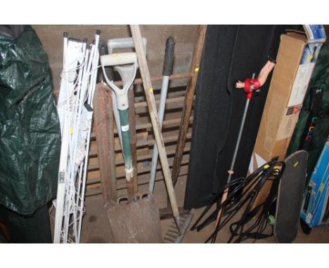 A quantity of long handled gardening tools 