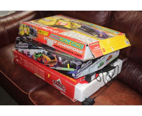 Three boxes of various Scalextric