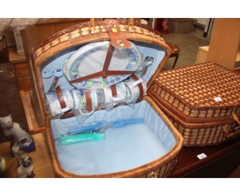 A wicker picnic hamper and contents 