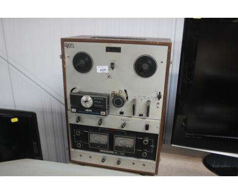 An Akai Solid State M-10 reel-to-reel player
