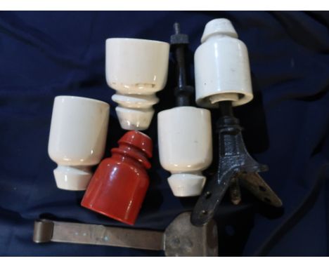 Four ceramic insulators, an LNWR ceramic insulator on original cast iron bracket (height 28cm) and a copper and brass scrape,