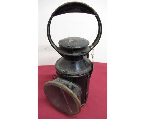 London Transport underground oil signal lamp marked LT, in black finish (glass front cracked), H30cm 