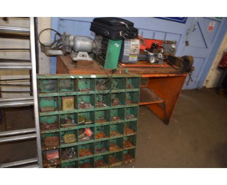 A workbench with lathe (fixed appliance) and grinder