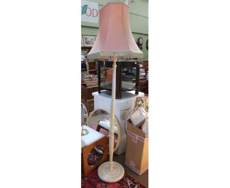 A PAINTED WOODEN STANDARD LAMP with tasseled shade 