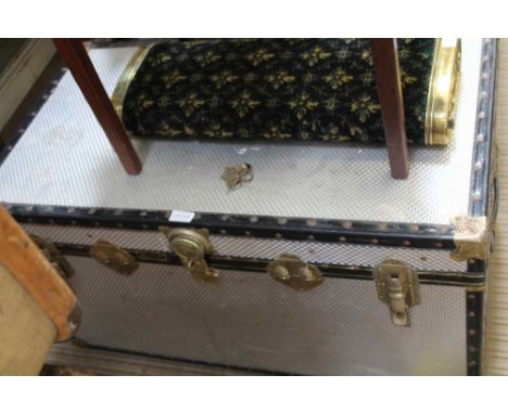 A METAL BOUND STEAMER TRUNK branded "Mossman" 