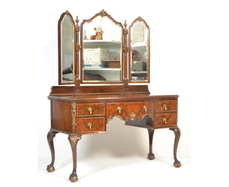 A Victorian 19th century rosewood serpentine fronted Maple &amp; Co dressing table. Raised on cabriole legs with gilded ball 