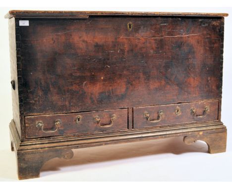 An 18th Century Georgian painted pine mule chest coffer blanket box raised on bracket feet with brass drop handles and backpl