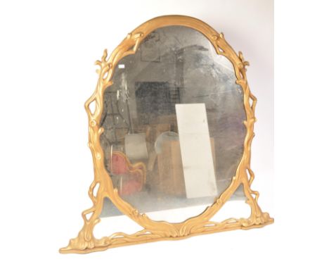 A very large 19th century Victorian giltwood overmantel mirror having a stunning bark - tree effect frame with angular additi