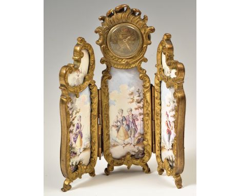 A late 19th / early 20th Century Austrian Viennese enamel and ormolu miniature triptych clock. The hand painted enamel panels
