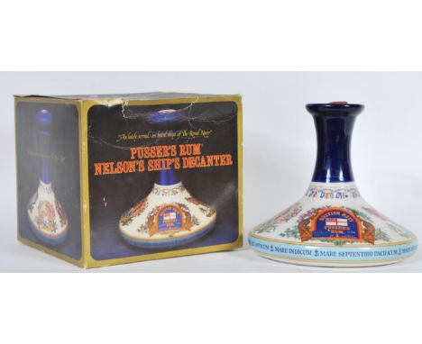 A British Navy Pussers Rum collectable decanter by Wade,&nbsp; ' Lord Nelson ' unopened, with wax seal, 54.5%, 1 litre. In or