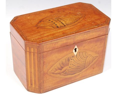 An 18th century George III satinwood and conch shell inlaid tea caddy of small proportions. Lozenge shaped with inlaid conch 