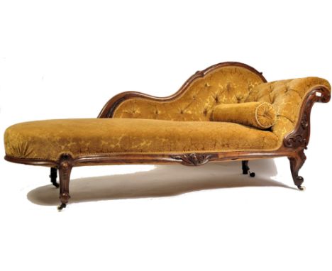 A good 19th century Victorian mahogany chaise longue day bed with show wood frame, raised on cabriole legs with hoof feet and