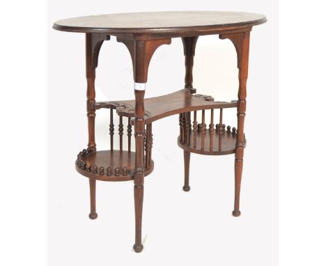 A Victorian Arts &amp; Crafts oak side&nbsp; / wine table in the manner of Edward William Godwin. The table raised on turned 