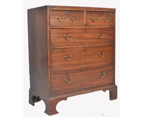 A George III 19th century mahogany bachelors 2 over 3 chest of drawers being raised on ogee&nbsp; bracket feet with 2 short o