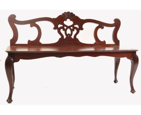 A rare 18th century / early 19th century George III butlers / servants hall bench. Raised on cabriole legs with fitted frieze