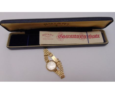 Rotary 9ct yellow gold ladies wristwatch on a 9ct gold articulated bracelet to include original watch packaging