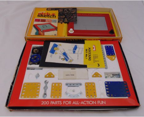 Vintage 1970s Meccano 3 set, boxed 1970s Etch-a-Sketch, a Chad Valley soccer game in original packaging and two large tins of