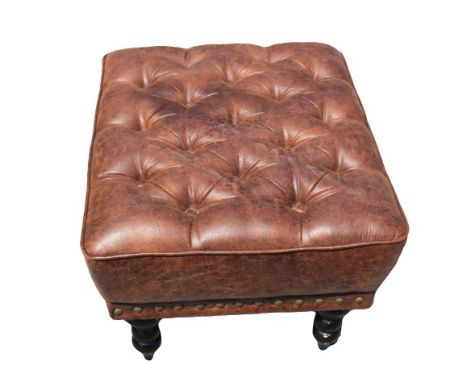 Large button tufted leather ottoman, on casters. Measurements: 26 x 22 x 16 in. Please note that all sales are final and no r