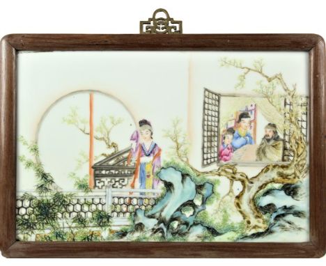 Exceptionally decorated landscapes with figures in a Chinese interior, looking through a window. With fine famille rose ename