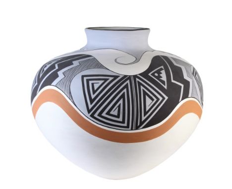Large water jar from Isleta Pueblo, orange and black geometric pattern on white background, oval-shaped rim. This jar has rel