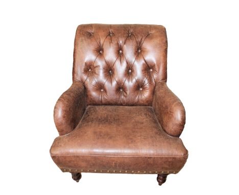 Leather arm chair with Southwestern upholstery, nailhead trim. Size: 34 1/2 x 31 x 36 Please note that all sales are final an