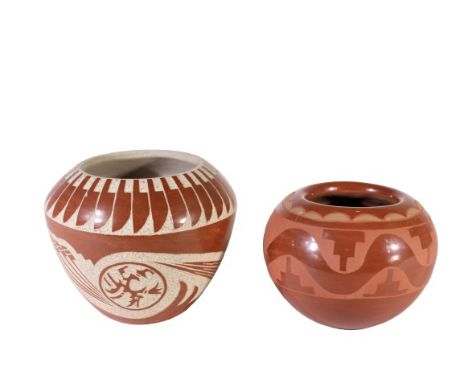 Beautiful redware vases, the red and white is signed by a descendent of the famous Nampeyo, who inspired dozens of family mem