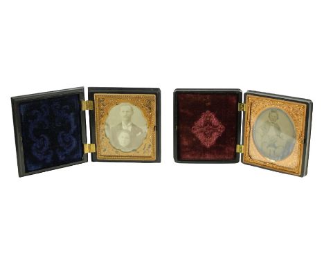 Image of a husband and wife, and another of a young child, in thermoplastic cases with velvet linings. Size: 3 1/2 in wide an