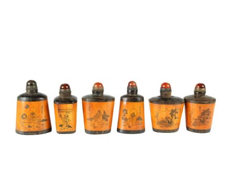 Chinese carved wooden snuff bottles with etched scenes of buddahs and markings. Each has an amber topper. Please note that al