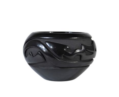 Beautiful blackware bowl, black on black step design. Signed by the artist Stella Chavarria, Santa Clara. Measurements: 3 1/2