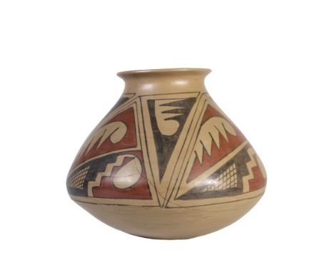 Finely crafted tan pottery jar with black and red geometric feather design. Commensurate with age, there is a fine crack alon