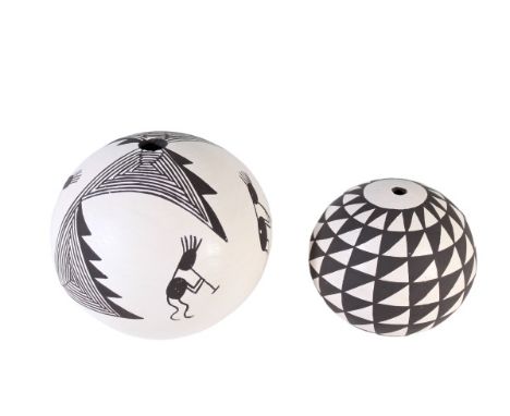 Pair of pottery globes or vases, black and white slip with geometric design. Both are signed by the artist. Dolores Lewis, wh