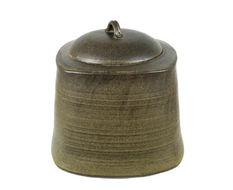 Signed covered vessel with swirl. Size: about 9 3/4 in. H x 10 in. W Please note that all sales are final and no refunds will