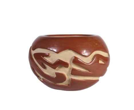 Native American Santa Clara highly burnished and carved redware with tan decoration. Signed in distinctly. Measures: 3 1/2 x 