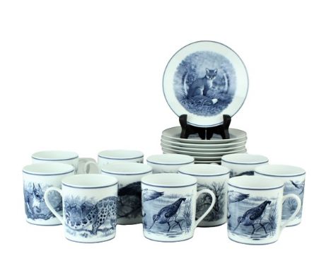 "Animalia" blue gray animals and trim. 11 cups and 14 plates by Hermes. All plates depict a fox, cups have three different im