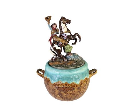 Young woman riding a horse on the lid.  Approx 13 in tall. Please note that all sales are final and no refunds will be given 