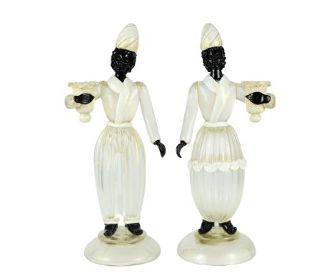 Two elegant female figures. Size: 13 1/2 x 5 1/2 in x 2 in.. Please note that all sales are final and no refunds will be give