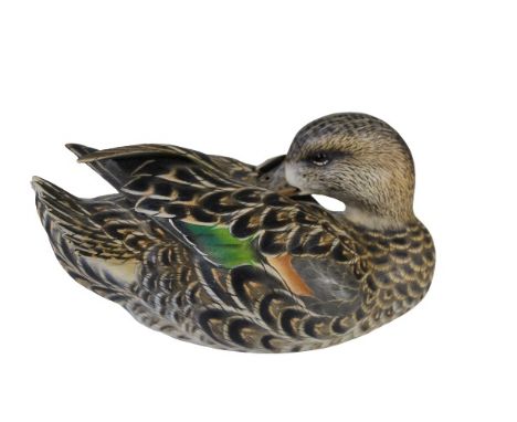 Finely painted decorative duck decoy, signed by master carver Carl Danos. Measurements: 4 1/2 x 9 in. Please note that all sa