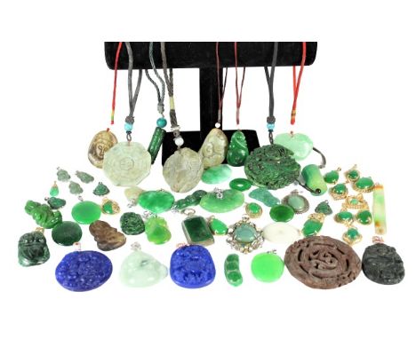 Several small pendants full of green stones and jewels, with a few blue stone pendants and brown stone pendants. Please note 